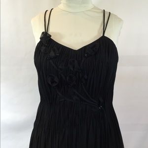 Silk evening gown with criss cross spaghetti strap